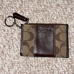Small keychain coach good for cash and cards on the go